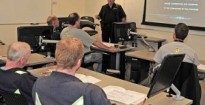 Instructor David Rogers from BC Hazmat Management Ltd. teaches a Workplace Hazardous Materials Information System (WHMIS) course to employee