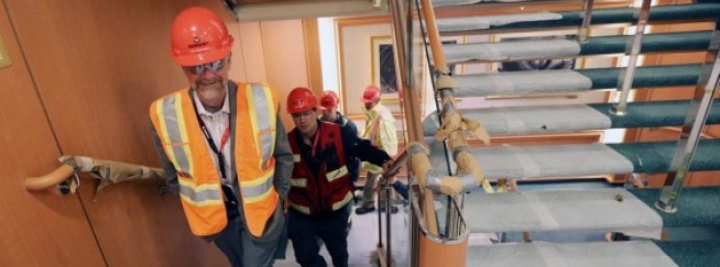 Joe OÍRourke of Victoria Shipyards leads the media and guests on a tour of the ship.   Photograph By ADRIAN LAM, Times Colonist 